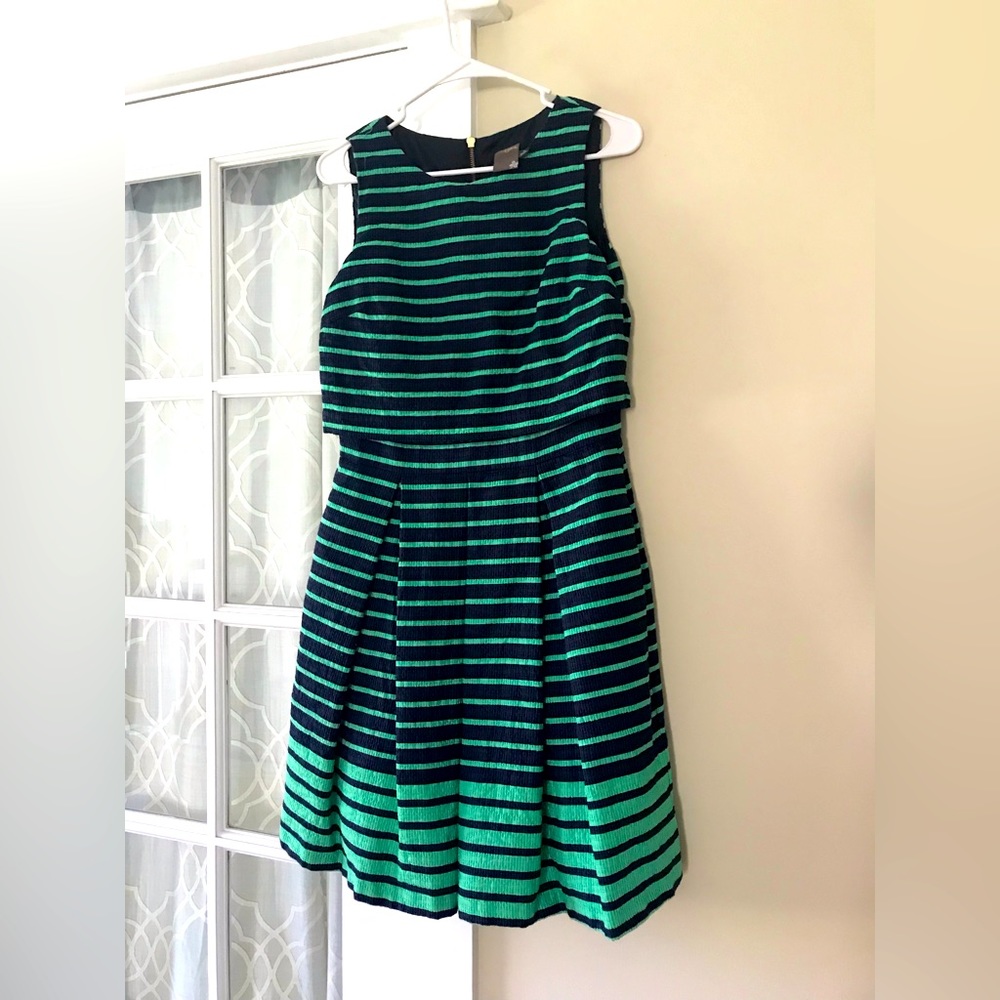 Taylor size 8 green striped dress, black background. Perfectly preppy for spring